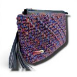 Λεπτομέρειες από το πλεκτό clutch Marinevi με δερμάτινα στοιχεία