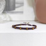 μελιτζανί macrame βραχιόλι με bronze πολυγωνικά κρύσταλλα