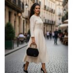 Πλεκτή τσάντα χειρός ELEGANCE NOIR φορεμένη σε elegant city look